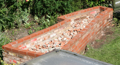 Bricks complete, rubble filling has commenced